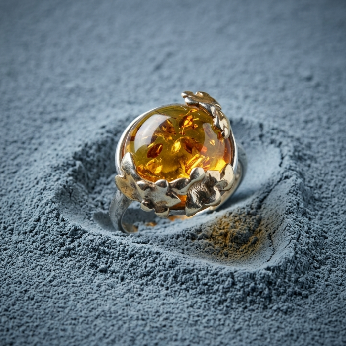 Authentic Baltic Amber .925 Sterling Silver handcrafted ring; s. 6 adjustable - Sterling silver ring with amber stone close-up on textured surface.