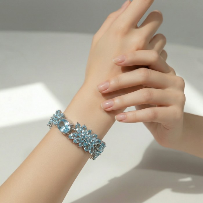 Pacifica 105.5 carat Swiss Blue Topaz .925 Sterling Silver handmade Statement Bracelet - Worn on hand, Swiss Blue Topaz bracelet in sterling silver.