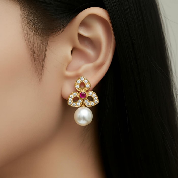 Magnificent Jewel 4.5 carat Ruby 14K Gold over .925 Sterling Silver handcrafted incredible earrings - Earring with ruby and pearl in 14K gold, worn on ear, side view.