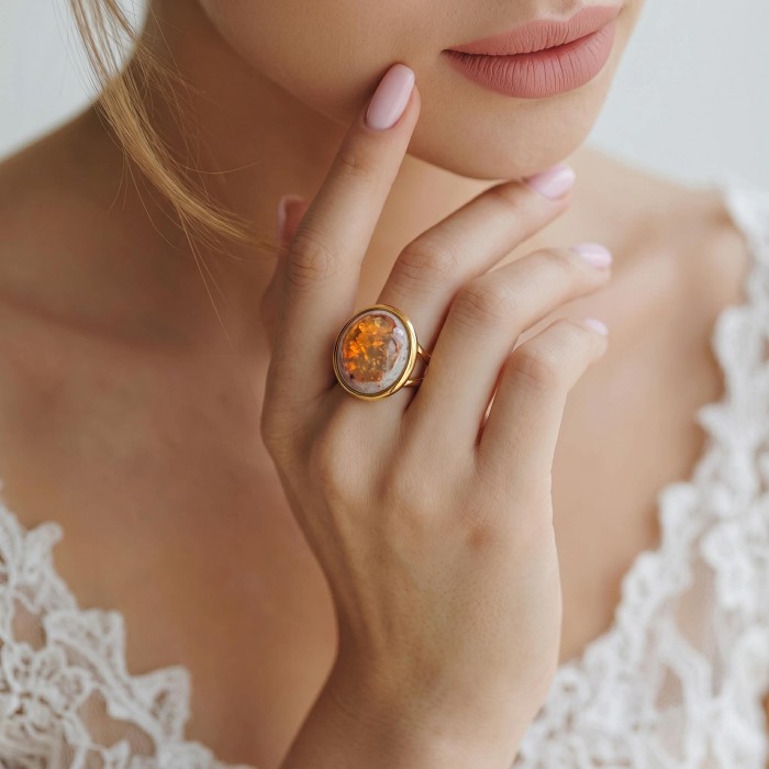 Queen of Fire best quality 18.4 carat Mexican Opal 18K Gold over .925 Sterling Silver handmade ring 6 1/4 - Close-up of 18.4 carat Mexican Opal ring in 18K Gold worn on hand