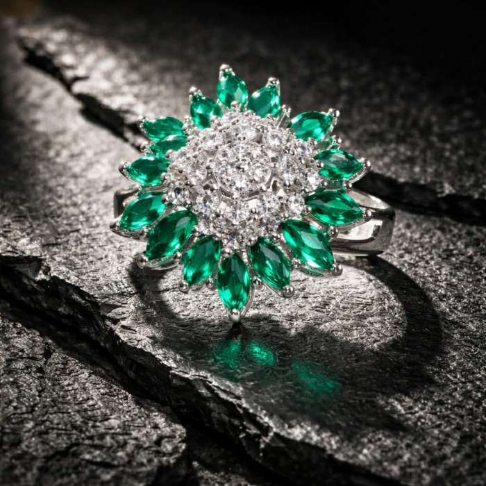 Spectacular Natural 6.8 carat Tsavorite Garnet .925 Sterling Silver handcrafted ring size 7 - Tsavorite garnet ring close-up on textured black surface.