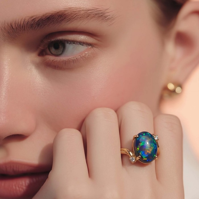 A Milky Way Genuine 4.8 carat Black Opal 18K Gold over .925 Sterling Silver handmade Ring size 7 1/2 - Opal ring worn on hand, showing close-up of 4.8 carat stone in 18K gold.