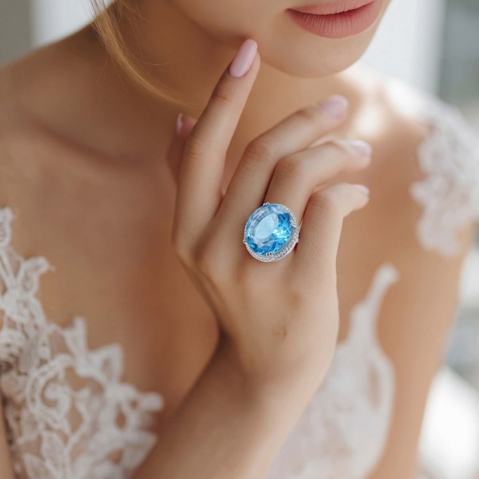 Eau Pure 14.5 carat Swiss Blue Topaz .925 Sterling Silver Handcrafted Statement Ring size 8 - Close-up of Eau Pure Swiss Blue Topaz ring worn on hand.
