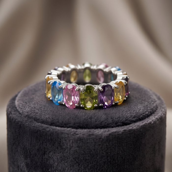 My own Rainbow - authentic 12.7 carat multigem .925 Sterling Silver Eternity Ring size 7 1/4 - Close-up of multigem ring on gray display
