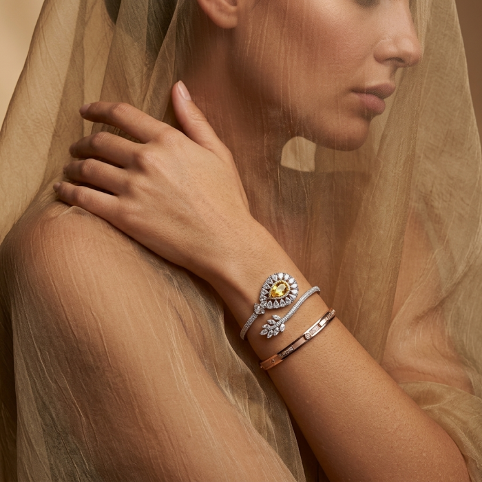 Dolce Vita - Precious Natural 18.5 carat yellow Sapphire .925 Sterling Silver handcrafted LARGE bracelet - Model wearing Dolce Vita bracelet with yellow sapphire, side profile view.