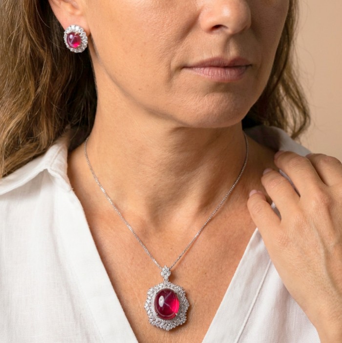 Red Cascade 37.2 carat Star Ruby .925 Sterling Silver .925 Sterling Silver Statement Necklace - Woman wearing Red Cascade star ruby necklace and earrings set.