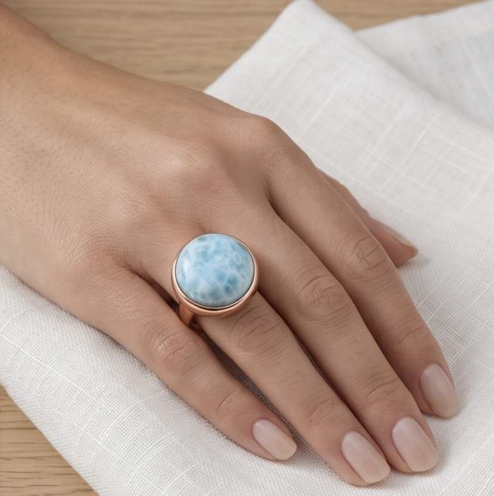 Perfection 22.9 carat Blue Larimar 22K Rose Gold over .925 Sterling Silver handmade ring size 8 adjustable - Blue Larimar ring in rose gold worn on hand, top view.