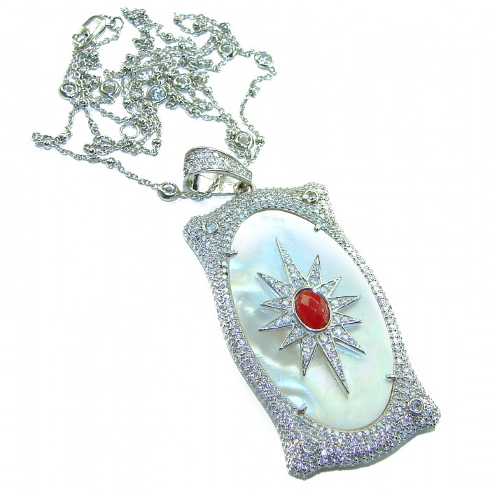 Precious Blister Pearl 2.4 carat Ruby .925 Sterling Silver .925 Sterling Silver Necklace; 24 inches long - Elegant pendant with ruby and pearl in sterling silver, top view.