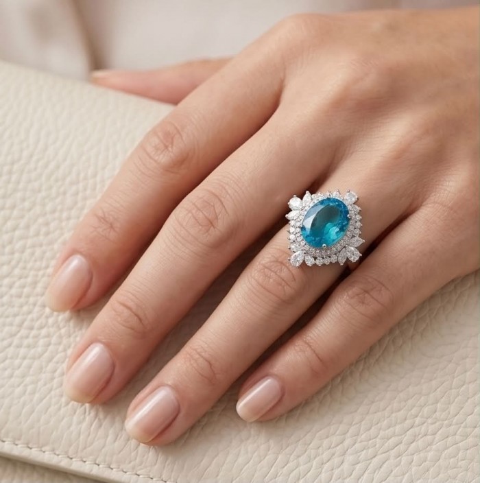 WONDERLAND 15.5 carat Paraiba Tourmaline .925 Sterling Silver Handcrafted Ring size 7 1/2 - Paraiba Tourmaline ring worn on hand, showcasing stone and design details.