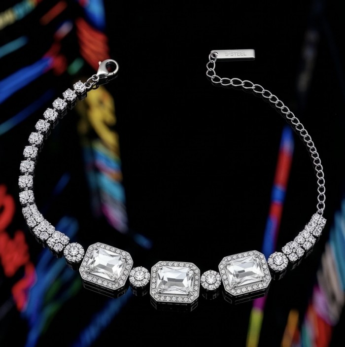 Mademoiselle 14.2 carat Moissanite .925 Sterling Silver Statement Bracelet - Moissanite bracelet on black background with colorful reflections