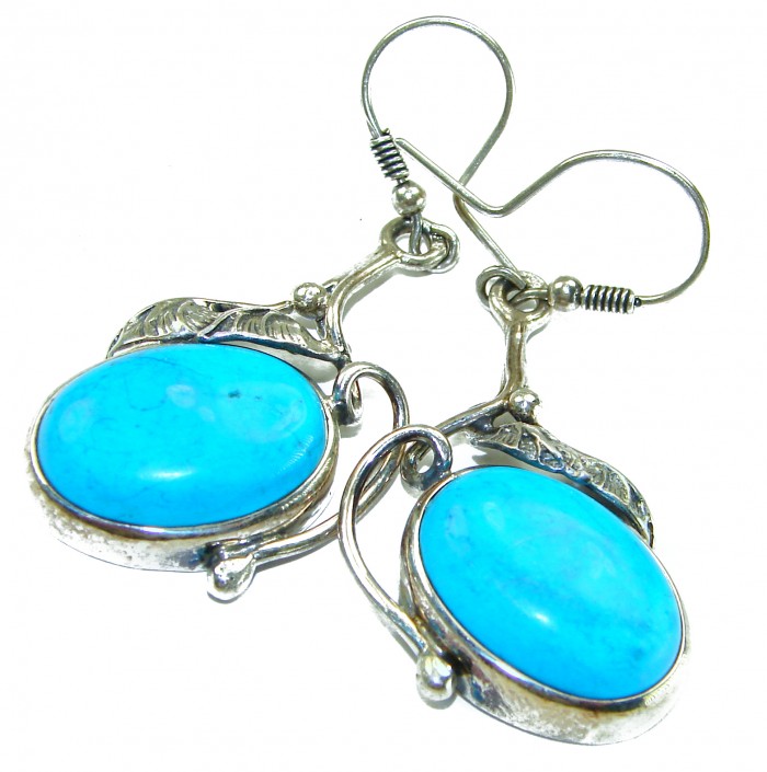 Great authentic Sleeping Beauty Turquoise .925 Sterling Silver handcrafted Earrings - Close-up of turquoise sterling silver earrings with hook detail.