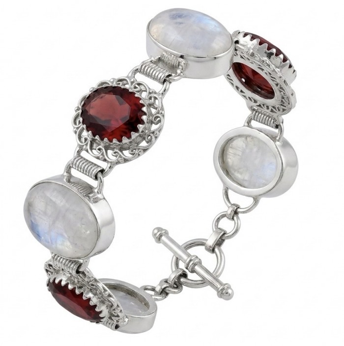 Top quality Genuine 105.8 carat Mountain Crystal .925 Sterling Silver handcrafted bracelet - Bracelet with red and clear stones, toggle clasp detail shown.