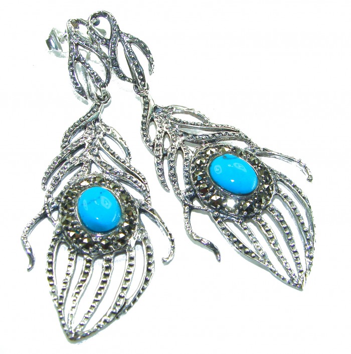 Peacock Feather design genuine Turquoise .925 Sterling Silver handcrafted Earrings - Peacock feather earrings with turquoise stone, front view.