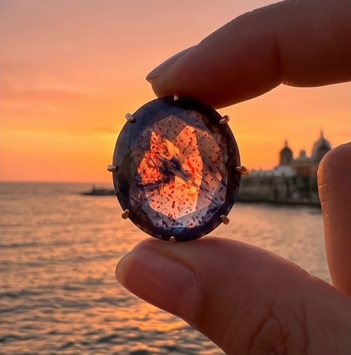 Born to Glam 14.2 carat natural Sapphire 18K Gold over .925 Sterling Silver Perfectly handcrafted Ring s. 8 - Close-up of Born to Glam 14.2 carat Sapphire against a sunset.