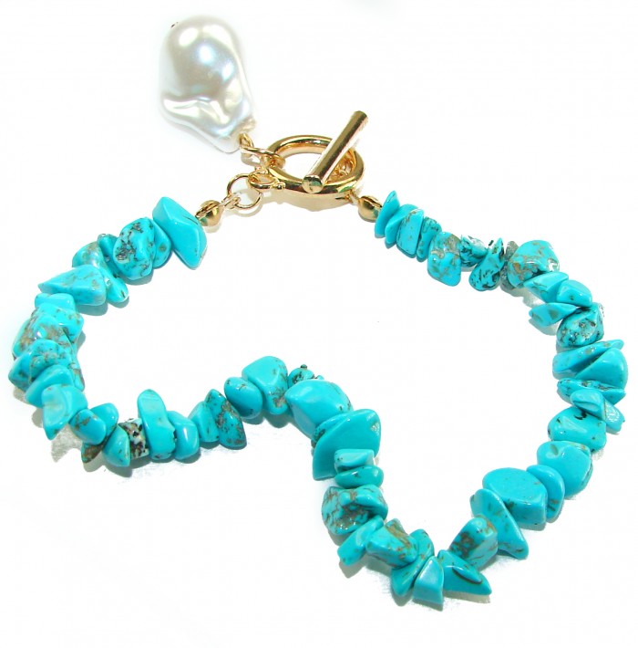 Beauty of Nature - natural turquoise 10K Gold over .925 Sterling Silver handmade Statement Bracelet - Turquoise bracelet with gold toggle clasp and pearl detail, top view.