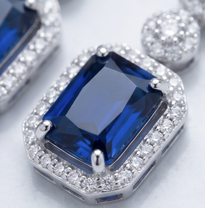 Ofelia - Authentic 8.7 CARAT natural Sapphire .925 Sterling Silver handcrafted .925 Sterling Silver handmade Statement earrings - Sapphire close-up with diamond accents on sterling silver setting.