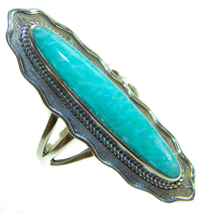 Rare authentic Turquoise .925 Sterling Silver handcrafted Large ring; s. 9 - Sterling silver ring with turquoise close-up, intricate detailing.