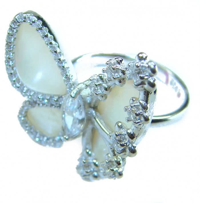 White Butterfly Blister Pearl .925 Sterling Silver brilliantly handcrafted ring s. 6 1/4 - Close-up of white butterfly ring with blister pearl and gems.