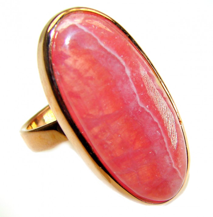 The best quality Argentinian Rhodochrosite 18K Rose Gold over .925 Sterling Silver handmade ring size 8 adjustable - Close-up of Argentinian Rhodochrosite ring in 18K Rose Gold setting.
