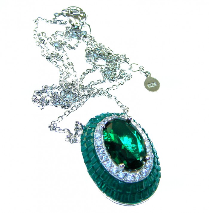 12.2 carat Graceful Natural Colombian Emerald .925 Sterling Silver handcrafted Statement necklace - Emerald necklace with chain, close-up of 12.2 carat stone and .925 tag.