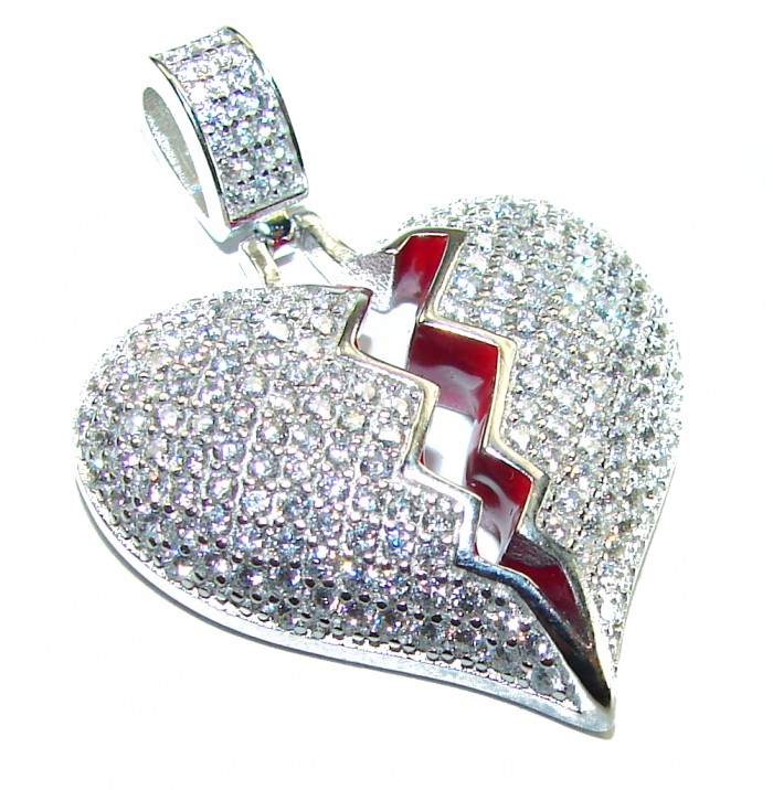 Broken Heart Luxurious 12.4 carat White Topaz .925 Sterling Silver handcrafted pendant - Close-up of a broken heart pendant with white topaz in sterling silver.