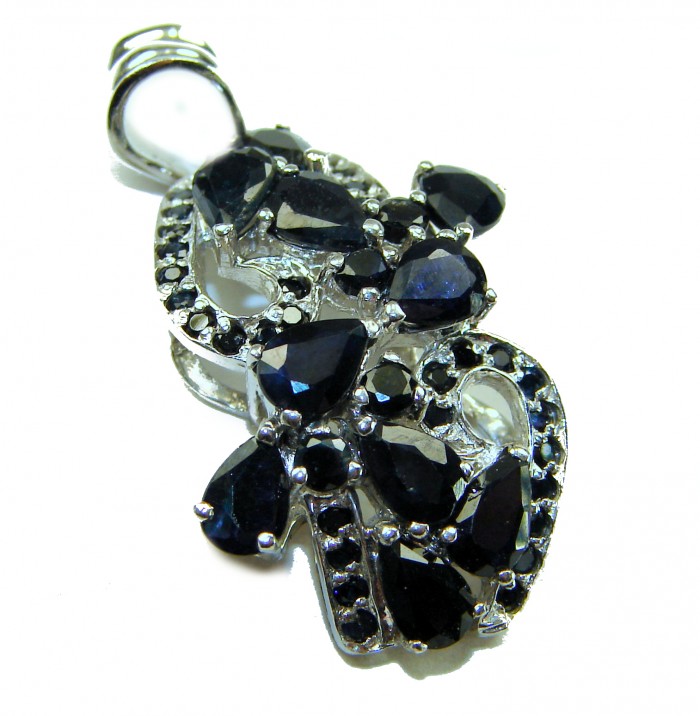Heirloom Genuine 14.5 carat Sapphire .925 Sterling Silver handmade Pendant - Pendant with sapphire stones on sterling silver, close-up view.