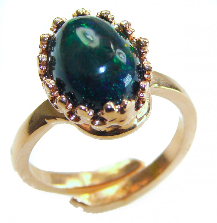 A COSMIC POWER Genuine 9.2 carat Black Opal 18K Gold over .925 Sterling Silver handmade Ring size 8 - Close-up of a black opal ring set in 18K gold.