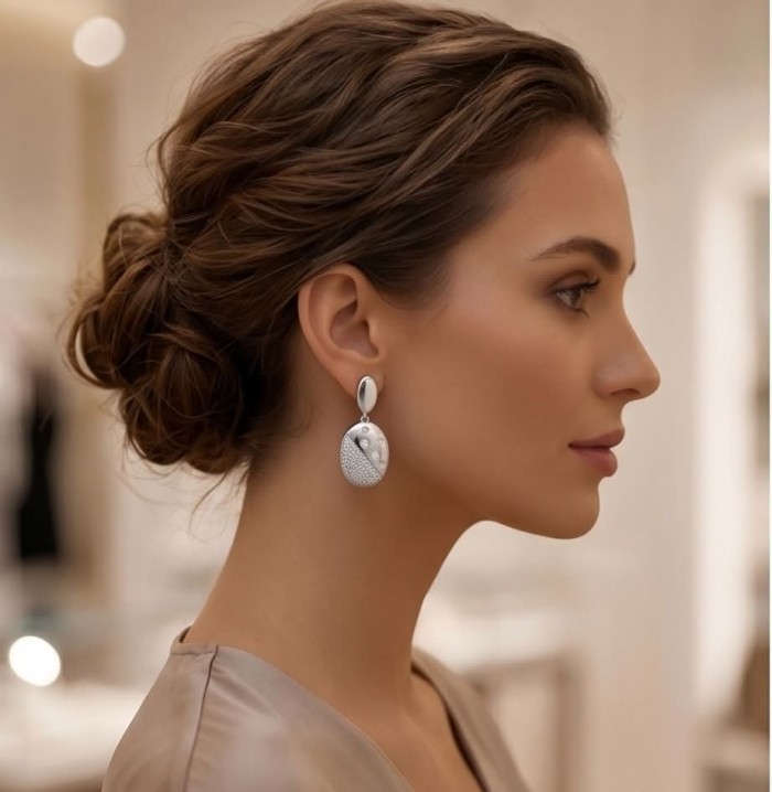 Stella Natural 2.2 carat White Topaz .925 Sterling Silver handcrafted earrings - Side view of woman wearing Stella white topaz sterling silver earring.