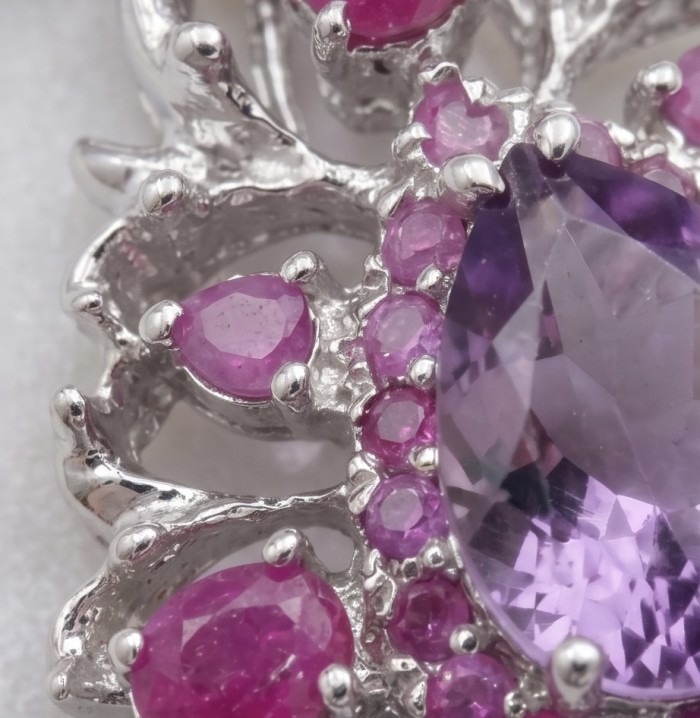 Francesca Genuine 18.5 carat Amethyst Kashmir Ruby rhodium over .925 Sterling Silver handmade Pendant - Close-up of Francesca Amethyst and Kashmir Ruby jewelry.