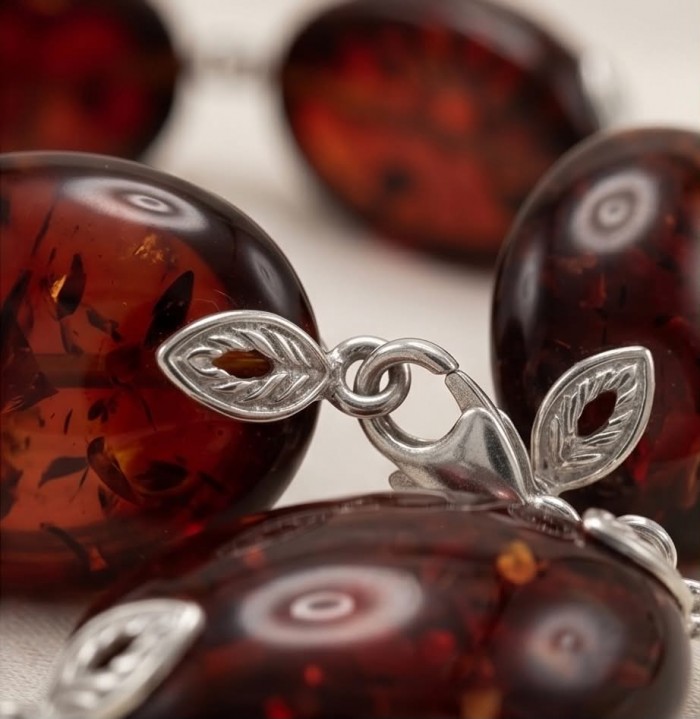 Excellent quality Cognac color Baltic Amber .925 Sterling Silver entirely handcrafted Bracelet - Clasp detail of Cognac Baltic Amber with .925 Sterling Silver leaves.