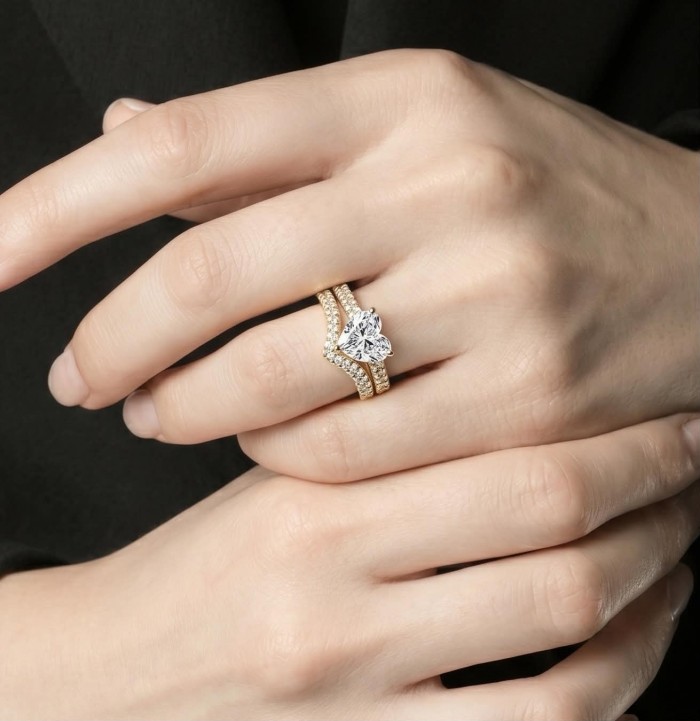 Sparkling pavé 4.5 carat Moissanite curve in a chic chevron shape Luxurios .925 Sterling silver Stackable Heart Ring size 7 - Moissanite chevron ring worn on hand, showing sparkling pavé details.