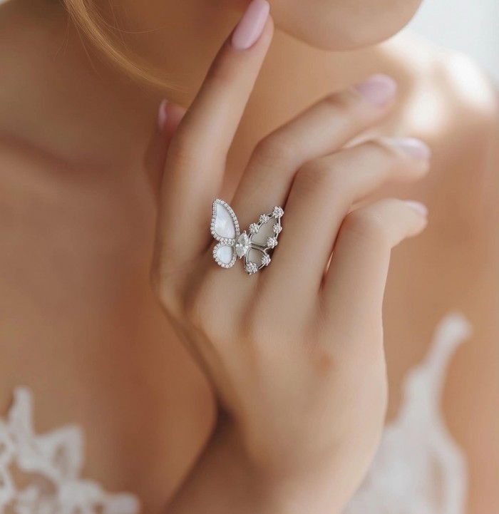 White Butterfly Blister Pearl .925 Sterling Silver brilliantly handcrafted ring s. 6 1/4 - Butterfly pearl ring on hand, side view close-up.