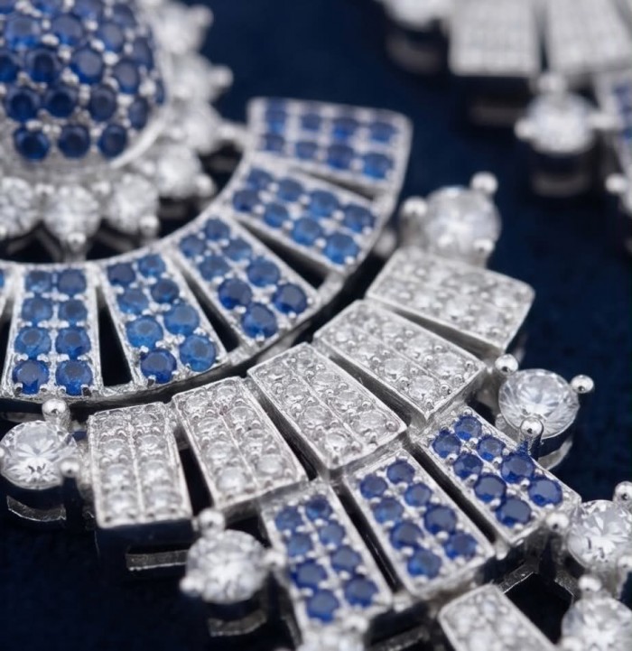 Authentic 4.7 carat Sapphire Rhodium over .925 Sterling Silver handcrafted Statement earrings - Close-up of sapphire and diamond sterling silver jewelry piece.