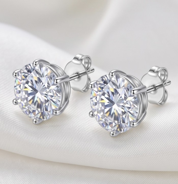 Veronica - 12.2 carat White Topaz rhodium over .925 Sterling Silver earrings, 10mm wide - White Topaz earrings side view on white fabric backdrop.
