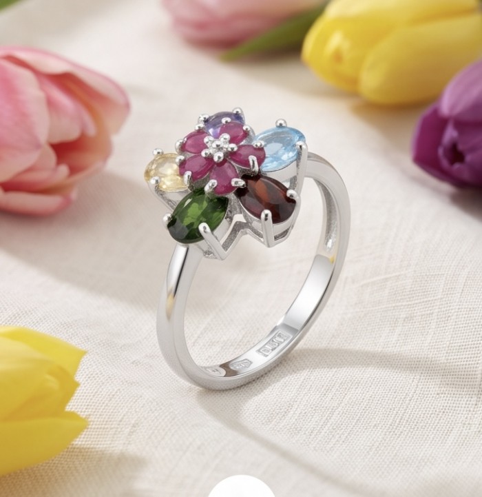 Flower 6.8 carat Multigem rhodium over .925 Sterling Silver Handcrafted Ring size 7 - Floral multigem ring on white cloth with colorful tulips in background.
