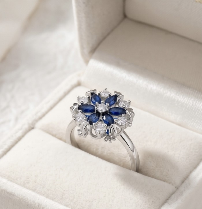 Real 3.2 carat Sapphire Italy Made Silver Sterling Silver spinning ring s. 8 1/4 - Top view of silver ring with blue sapphires and diamonds in box