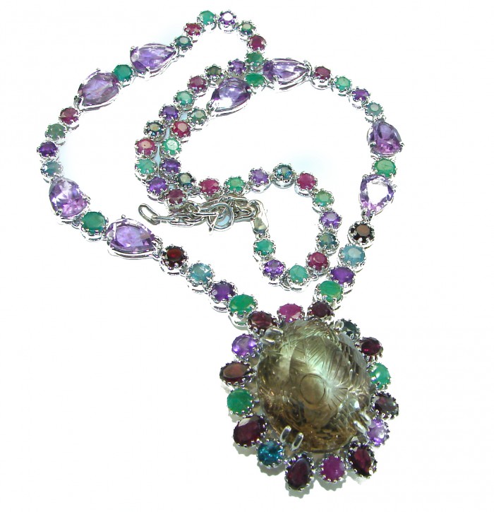 Outstanding carved 145.5 carat Smoky Topaz .925 Sterling Silver handcrafted Statement necklace - Colorful gemstone necklace with carved smoky topaz pendant, top view.