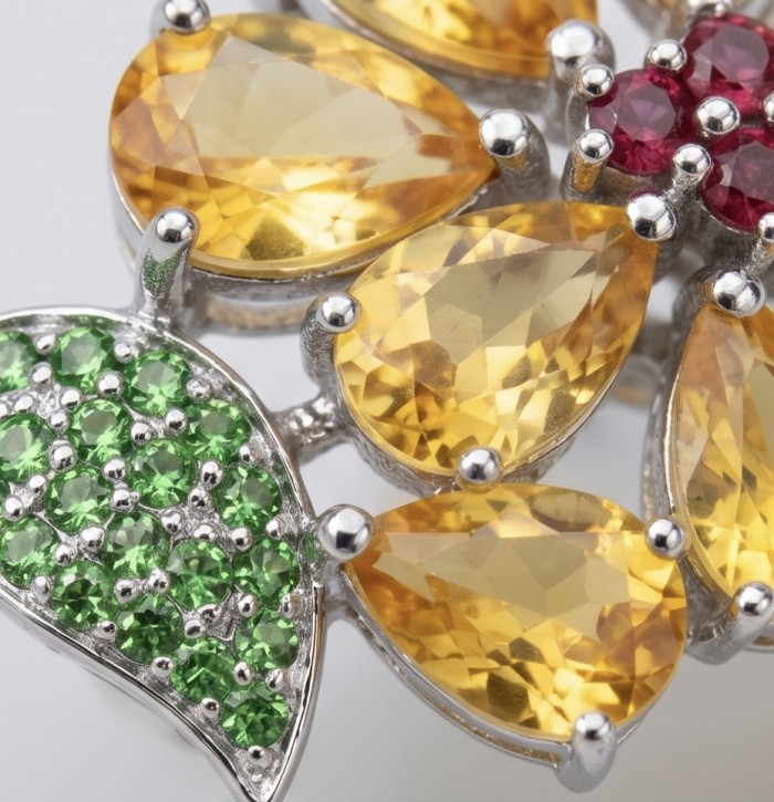 Vivien Luxurious Style - Natural 19.2 carat Brazilian Citrine .925 Sterling Silver dipped in rhodium handmade earrings - Close-up of colorful gemstone details on Vivien Luxurious Style jewelry.