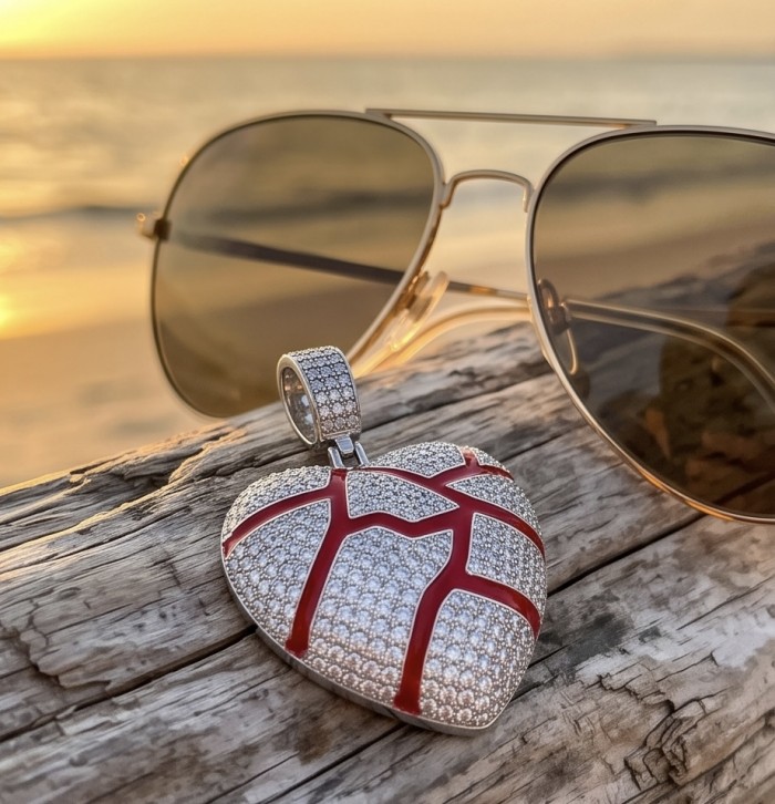Lava Heart Luxurious 8.4 carat White Topaz .925 Sterling Silver handcrafted pendant - Lava Heart pendant close-up with sunglasses against a sunset backdrop.