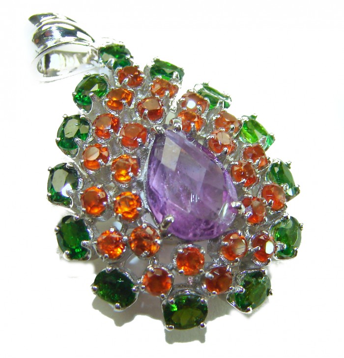 Purple Velvet - authentic 16.7 carat Amethyst .925 Sterling Silver handcrafted Pendant - Silver pendant with amethyst, orange and green stones, angled close-up.
