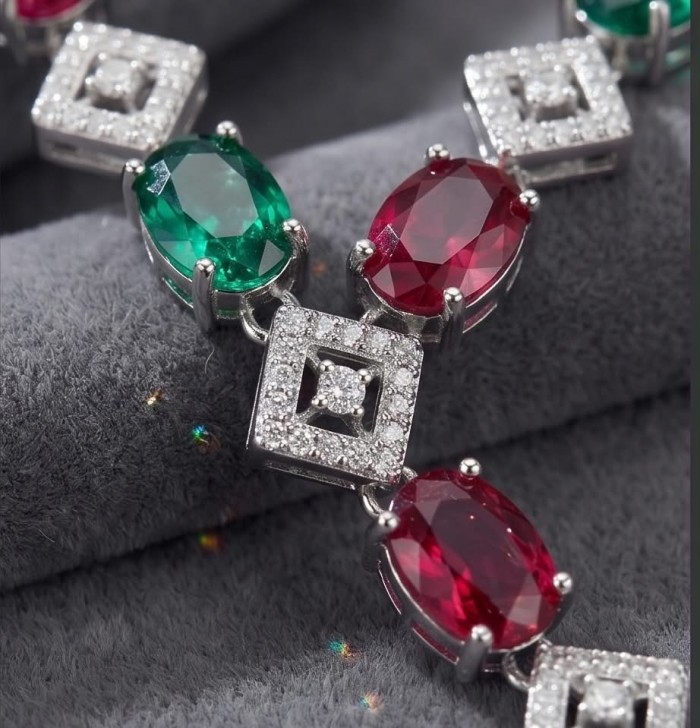Francesca - Luxurious natural 19.8 carat Ruby Emerald .925 Sterling Silver handmade Statement necklace - Close-up of Francesca bracelet with ruby, emerald, and diamond accents.