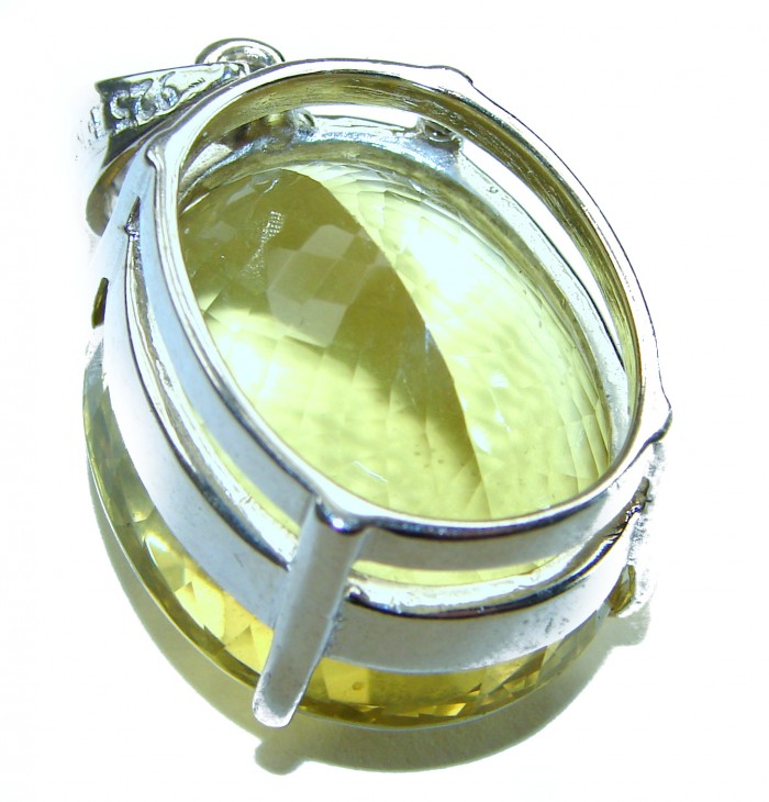 Perfection Oval cut 49.3 carat Lemon Quartz .925 Sterling Silver handcrafted LARGE pendant - Close-up of oval cut lemon quartz in sterling silver setting