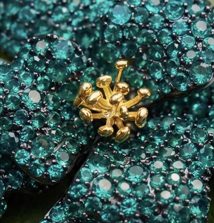 Retro Style - Precious Rose Genuine 22.5 carat Colombian Emerald black rhodium over .925 Sterling Silver handmade Pendant - Brooch - Close-up of emerald-studded jewelry with gold accents.