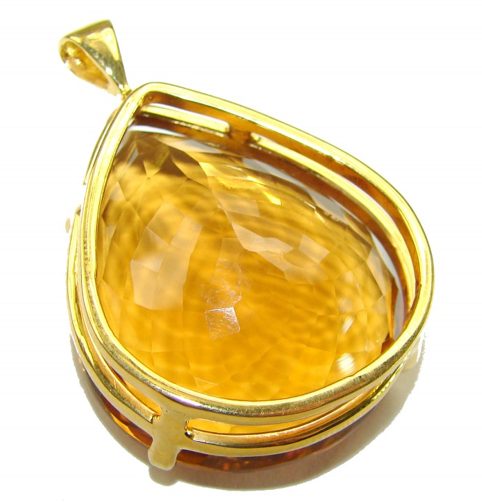 Luxury genuine 53.5 CARAT pear cut Champagne Topaz .925 Sterling Silver dipped in 18K Gold handmade Pendant - Close-up of pear cut champagne topaz pendant in gold setting.