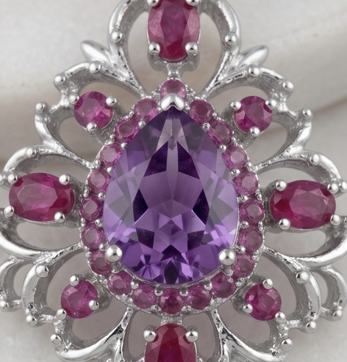 Francesca Genuine 22.7 carat Amethyst Kashmir Ruby rhodium over .925 Sterling Silver handcrafted earrings - Amethyst and ruby stone close-up with intricate silver detailing