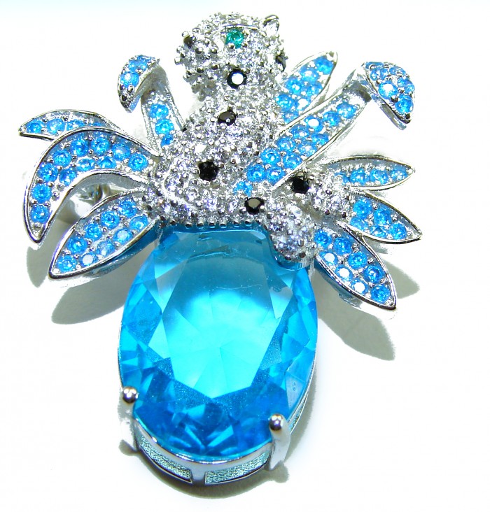 Blue Cheetah authentic 12.5 carat Swiss Blue Topaz .925 Sterling Silver Handcrafted pendant brooch - Blue topaz cheetah brooch, front view, silver and blue accent stones.
