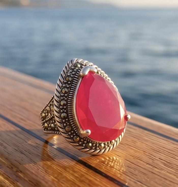 Carmen Natural 18.4 carat Ruby .925 Sterling Silver handmade Large Statement Ring size 8 - Close-up of a ruby ring in sterling silver by the water.