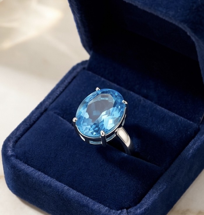 ENCHANTED OCEAN 28.3 carat Swiss Blue Topaz .925 Sterling Silver dipped in rhodium handcrafted Large ring size 8 - Swiss Blue Topaz ring in blue velvet box, stone close-up.