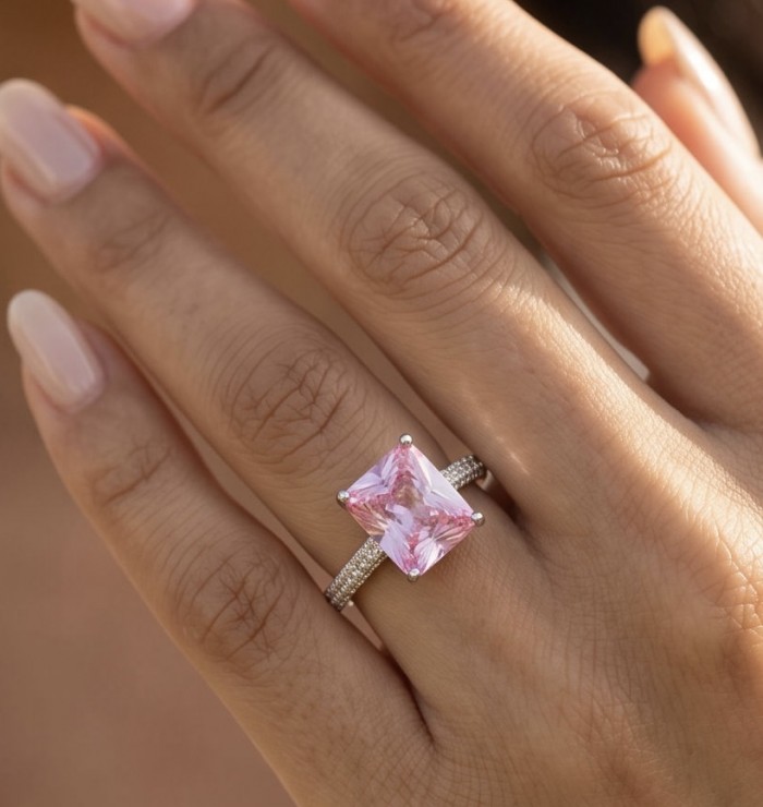 Anastasia princess cut 4.2 carat Pink Sapphire .925 Sterling Silver dipped in Rhodium Handcrafted Ring size 7 1/2 - Princess cut pink sapphire ring worn on hand, close-up view