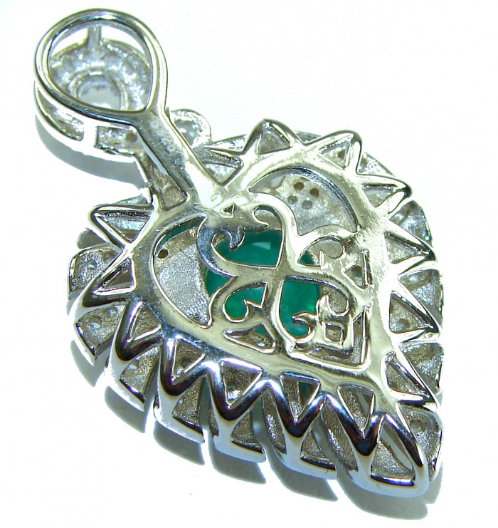 Luxurious Heart Genuine 5.2 carat Colombian Emerald .925 Sterling Silver Statement pendant - Close-up of heart-shaped emerald silver pendant from back angle.
